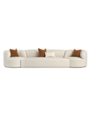 Modern Cream Curved Sofa – Deep Seats & Accent Pillows