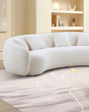 Modern Cream Curved Sofa – Channel Tufting & Sculptural Design