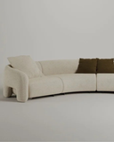 Luno Sectional — Curved Bouclé Sofa with Pillar Arms