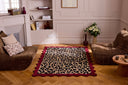 Âme fauve – Tapis en laine motif léopard - bordeaux