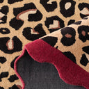 Âme fauve – Tapis en laine motif léopard - bordeaux