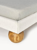 Lit matelassé avec pieds boules en bois Rena