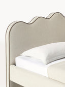 Lit matelassé avec tête de lit ondulée Romy