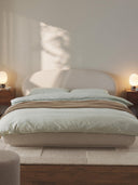 Lit matelassé arrondi en bouclette Alba