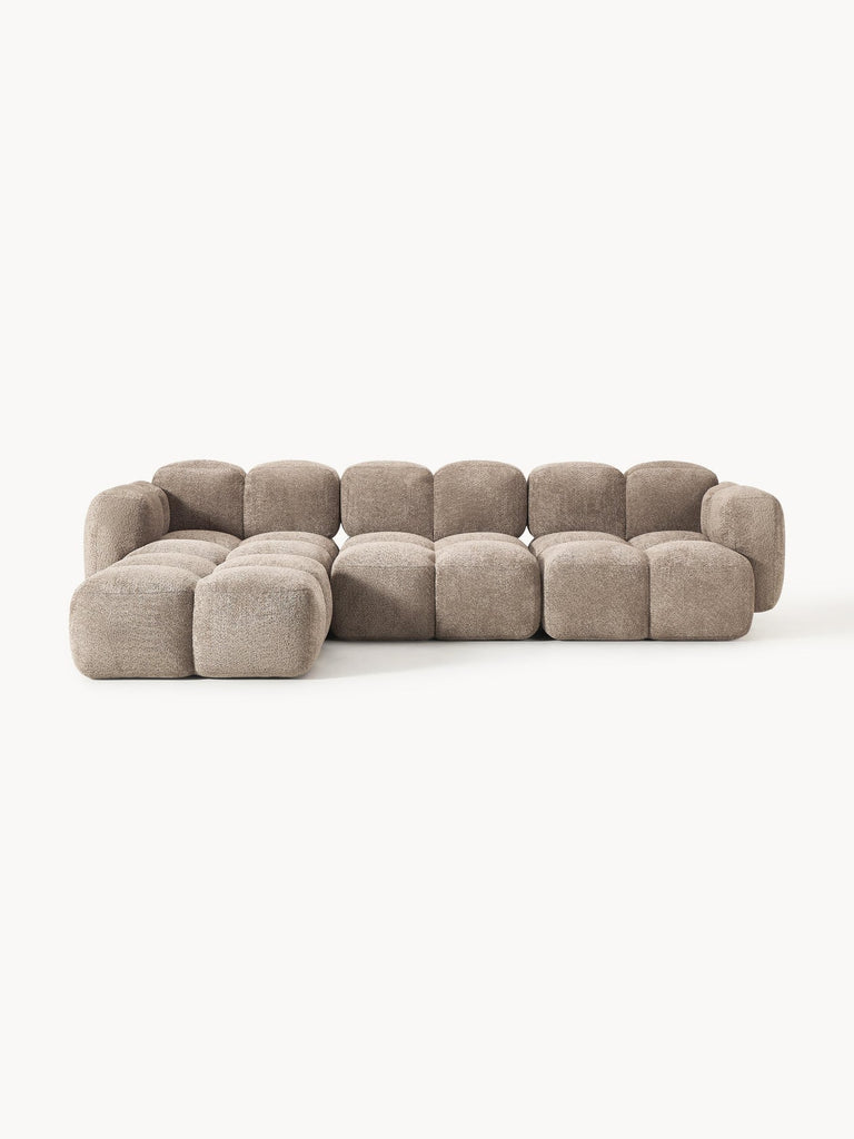 Canapé modulable 4 places en peluche-bouclette avec pouf Tayla