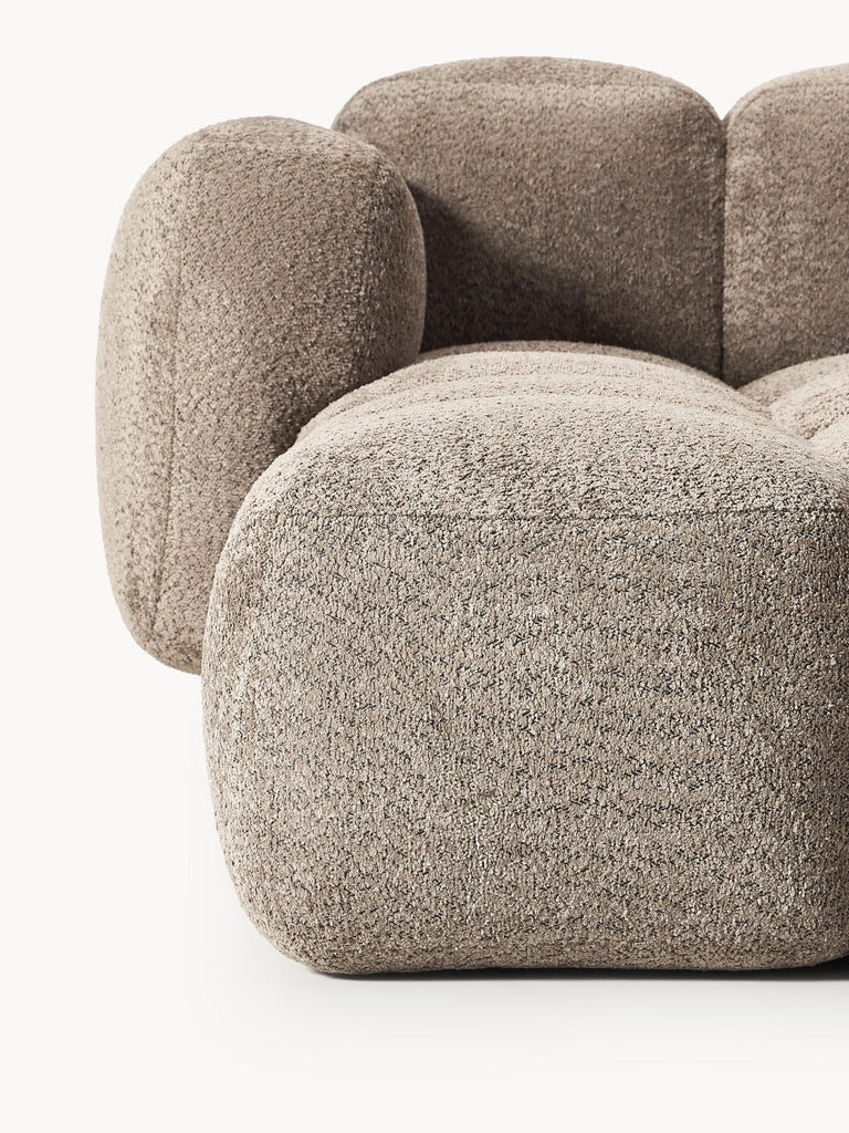 Canapé modulable 4 places en peluche-bouclette avec pouf Tayla