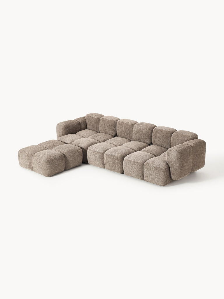 Canapé modulable 4 places en peluche-bouclette avec pouf Tayla