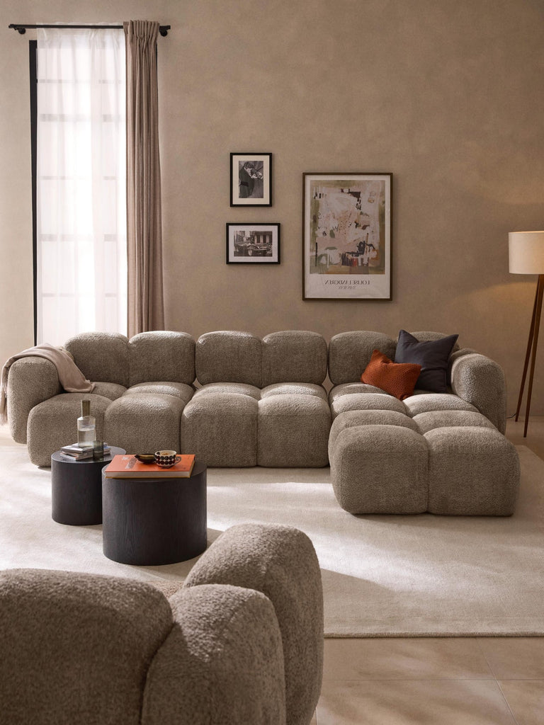 Canapé modulable 4 places en peluche-bouclette avec pouf Tayla