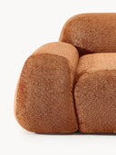Canapé d'angle modulable 4 places en peluche-bouclette Wolke