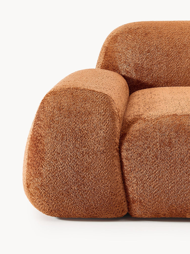 Canapé d'angle modulable 4 places en peluche-bouclette Wolke