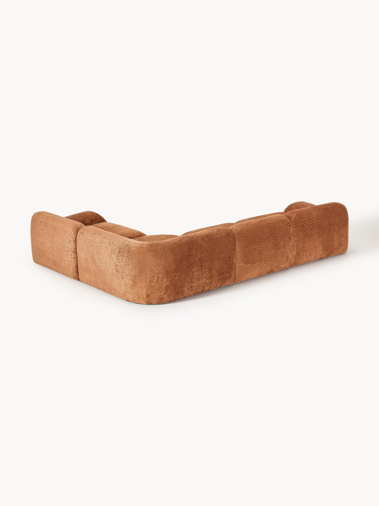 Canapé d'angle modulable 4 places en peluche-bouclette Wolke