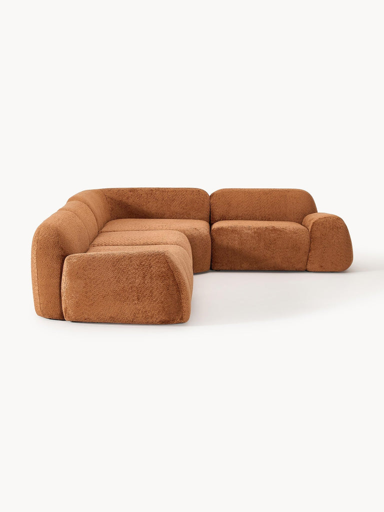 Canapé d'angle modulable 4 places en peluche-bouclette Wolke