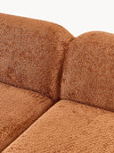 Canapé d'angle modulable 4 places en peluche-bouclette Wolke