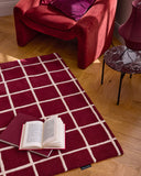 Rouge d'orage – Tapis en laine linéaire - Bordeaux