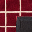 Rouge d'orage – Tapis en laine linéaire - Bordeaux