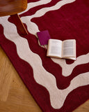 Rouge d'orage – Tapis en laine wavy - Bordeaux