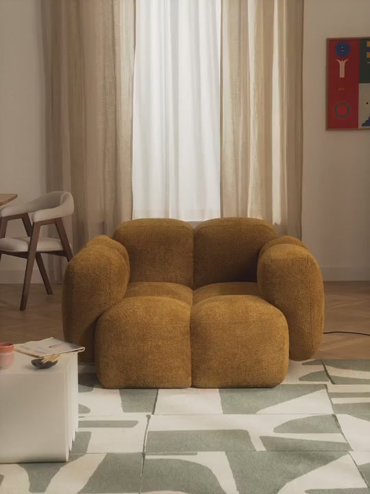 Fauteuil lounge en peluche-bouclette Tayla